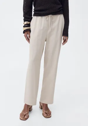 Elastic waist flowy trousers - Light Beige